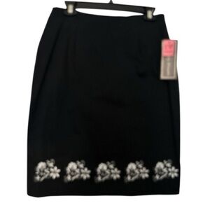 INTRIGUING THREADS vintage cotton A-Line skirt size 8. Black ,embroidery floral